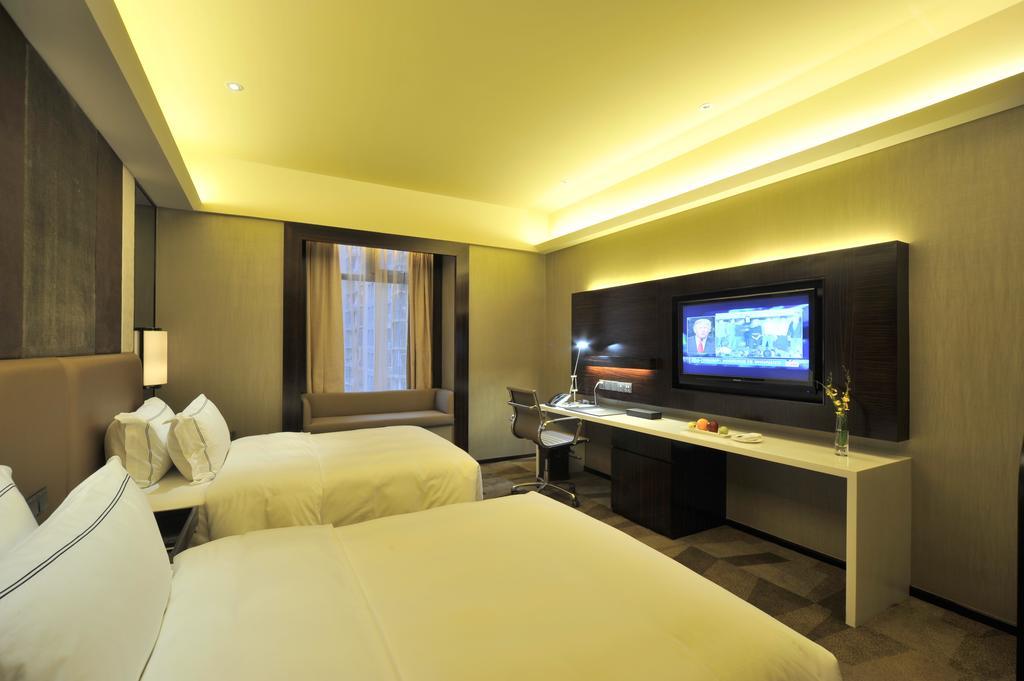 Royal Suites & Towers Wuhan Rum bild