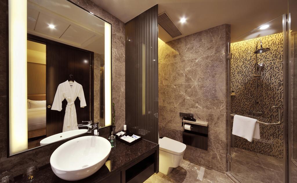 Royal Suites & Towers Wuhan Rum bild